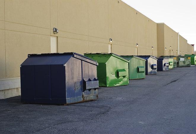 commercial disposal bins at a construction site in Athens